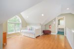 Upper level lofted area adjacent to the primary bedroom and bathroom